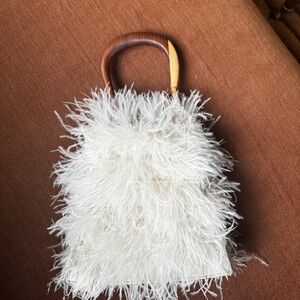Brand new feather handbag